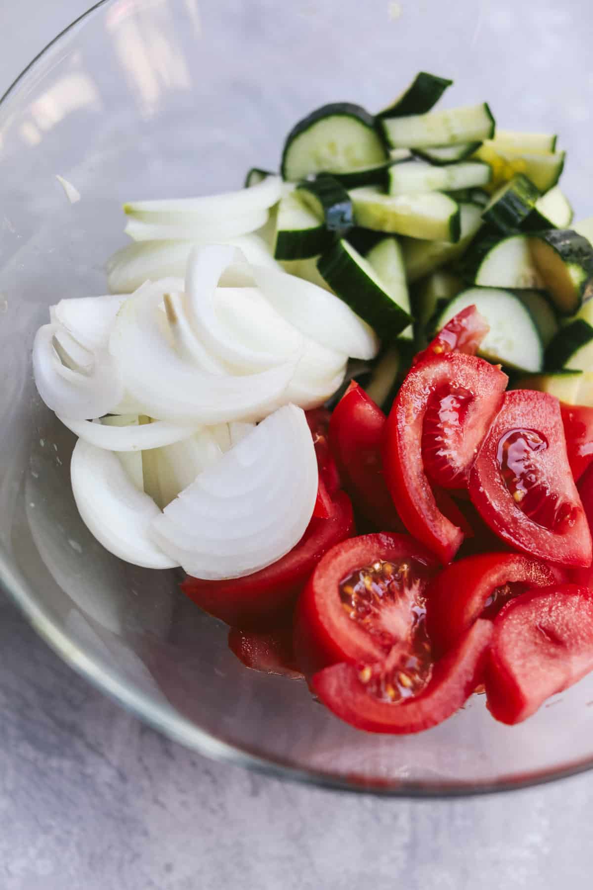 sliced tomato cucumber and onion