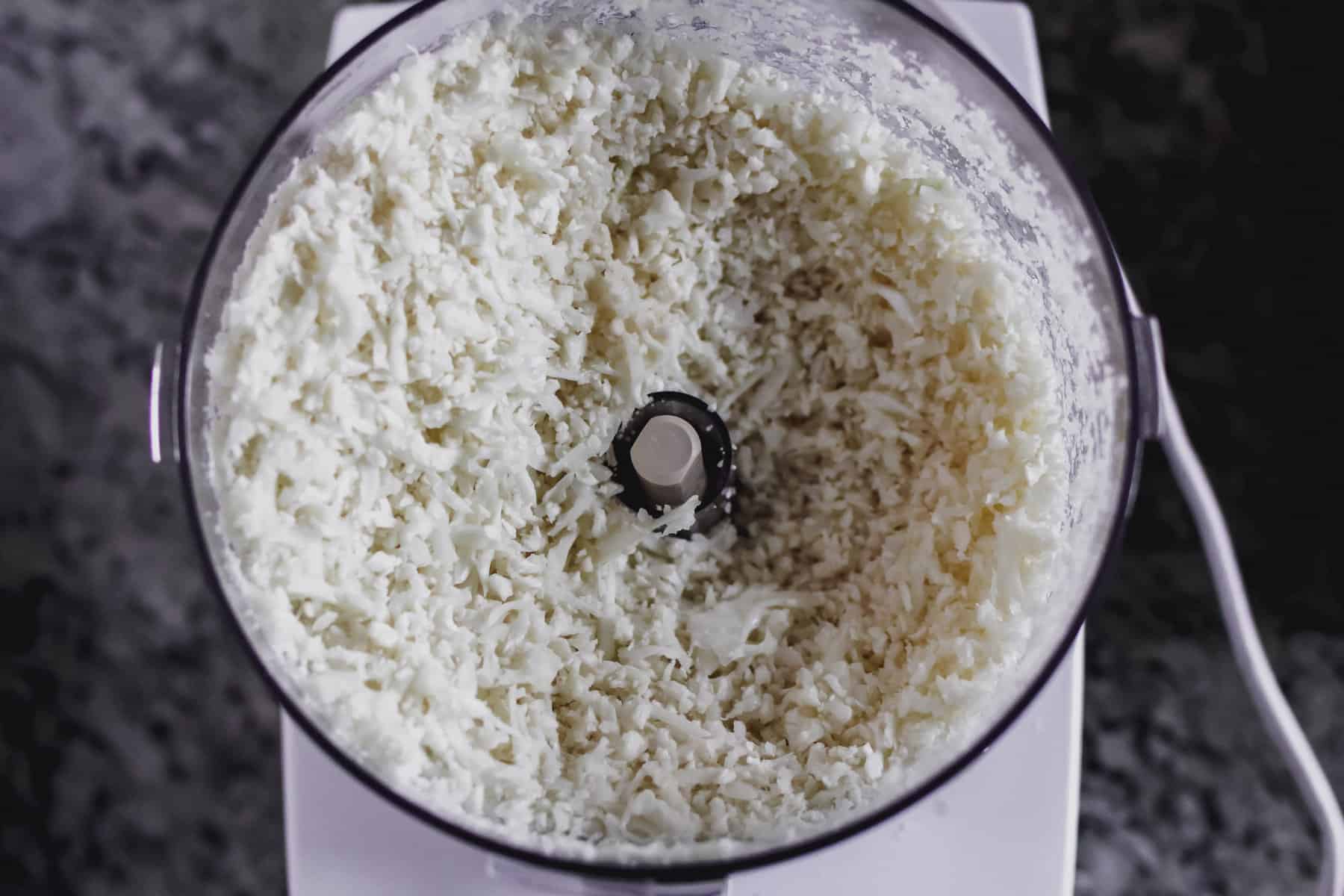 Ricing Cauliflower in the food processor 