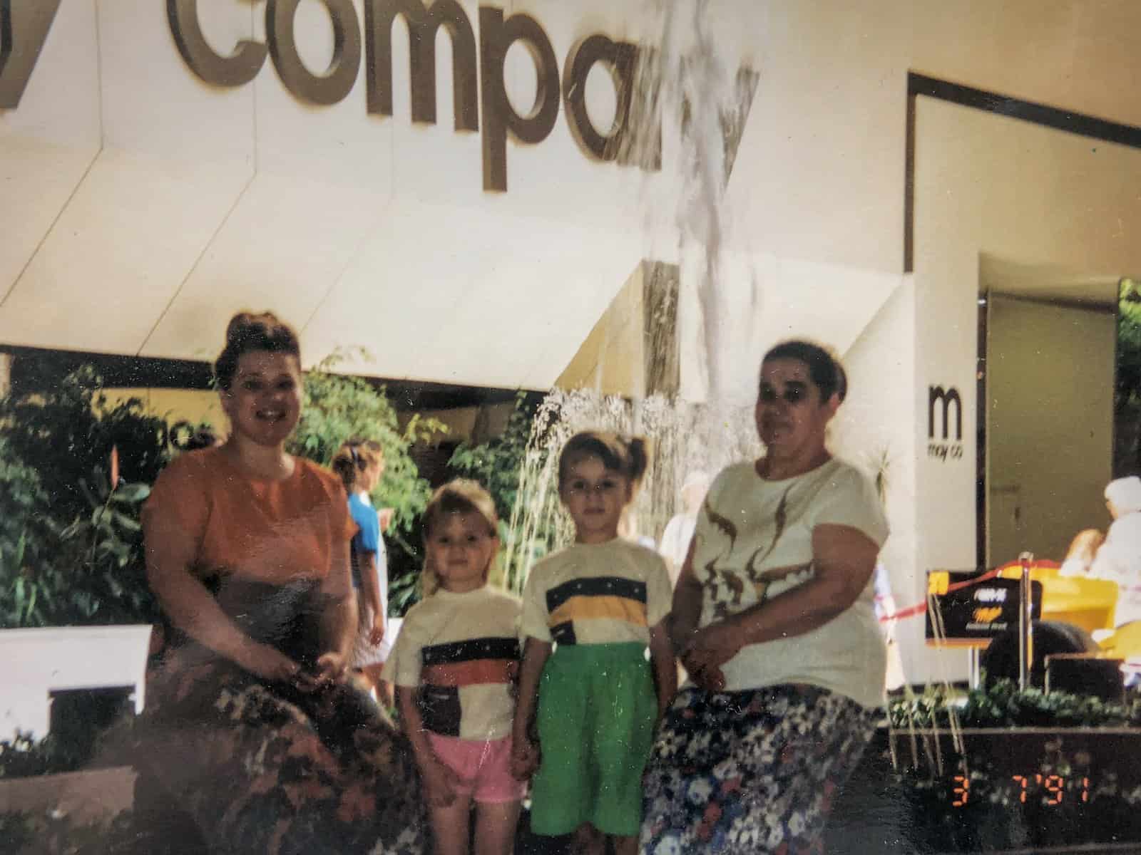 My mom, me, my sister and Baba Anna at the mall in 1991