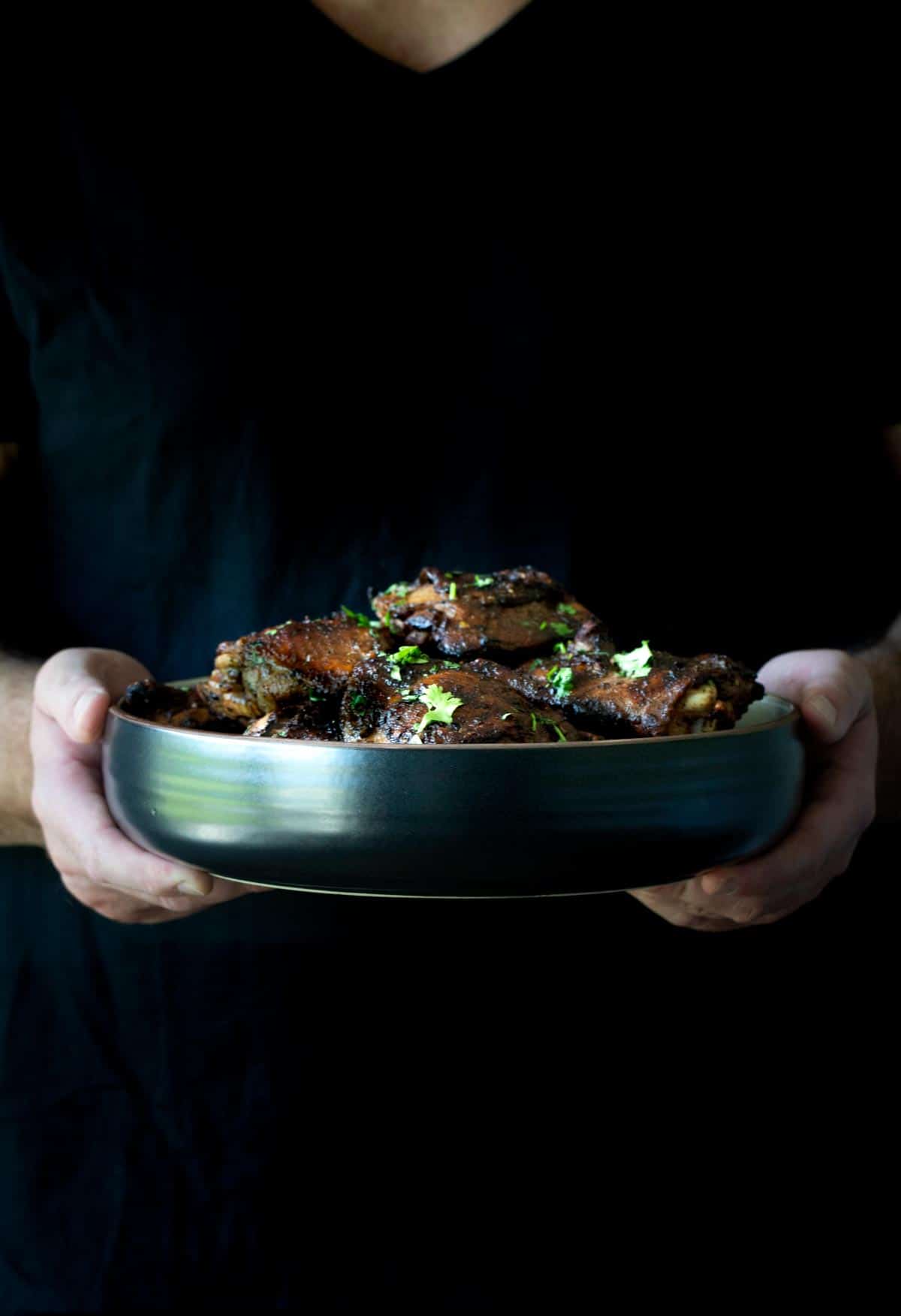 Holding Jerk Chicken