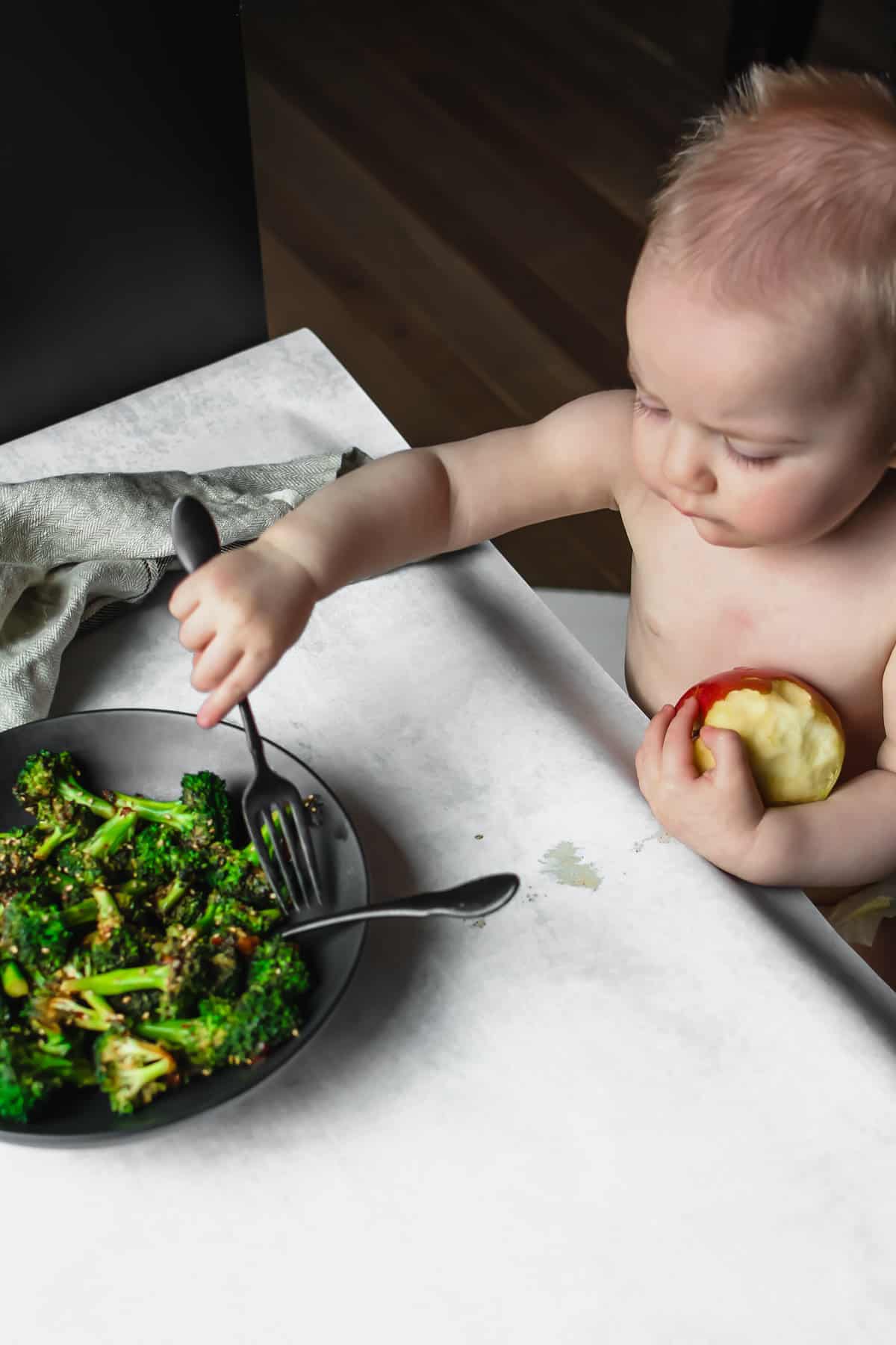 child eating clean keto broccoli 
