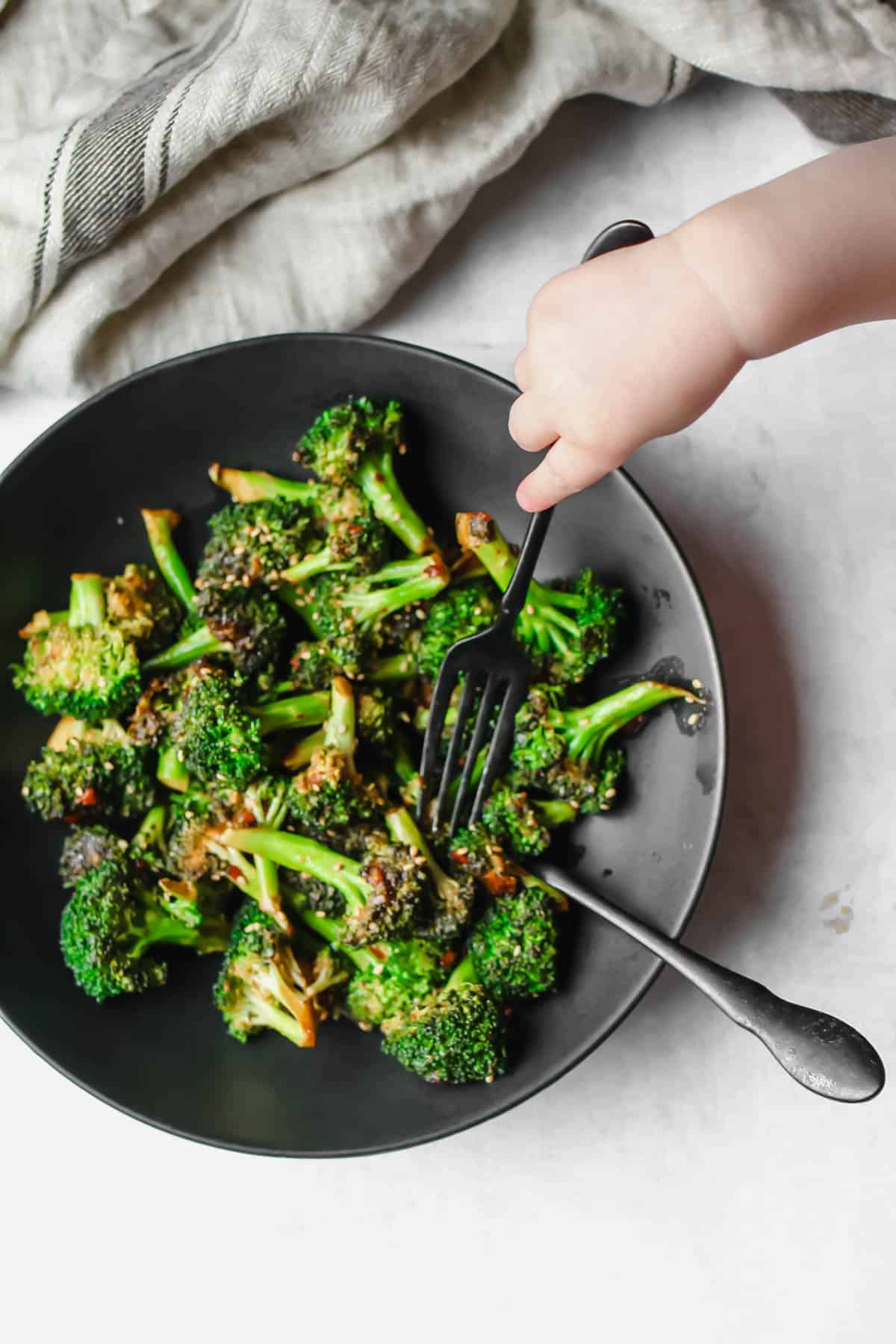 keto Gochujang Sesame Broccoli in black bowl