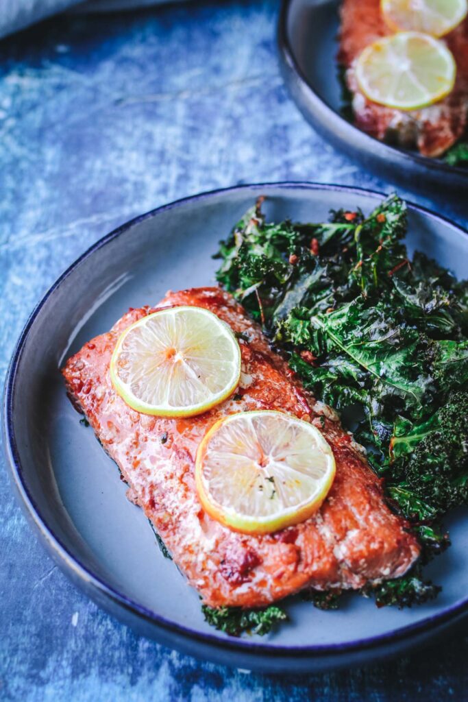 salmon with harissa and kale