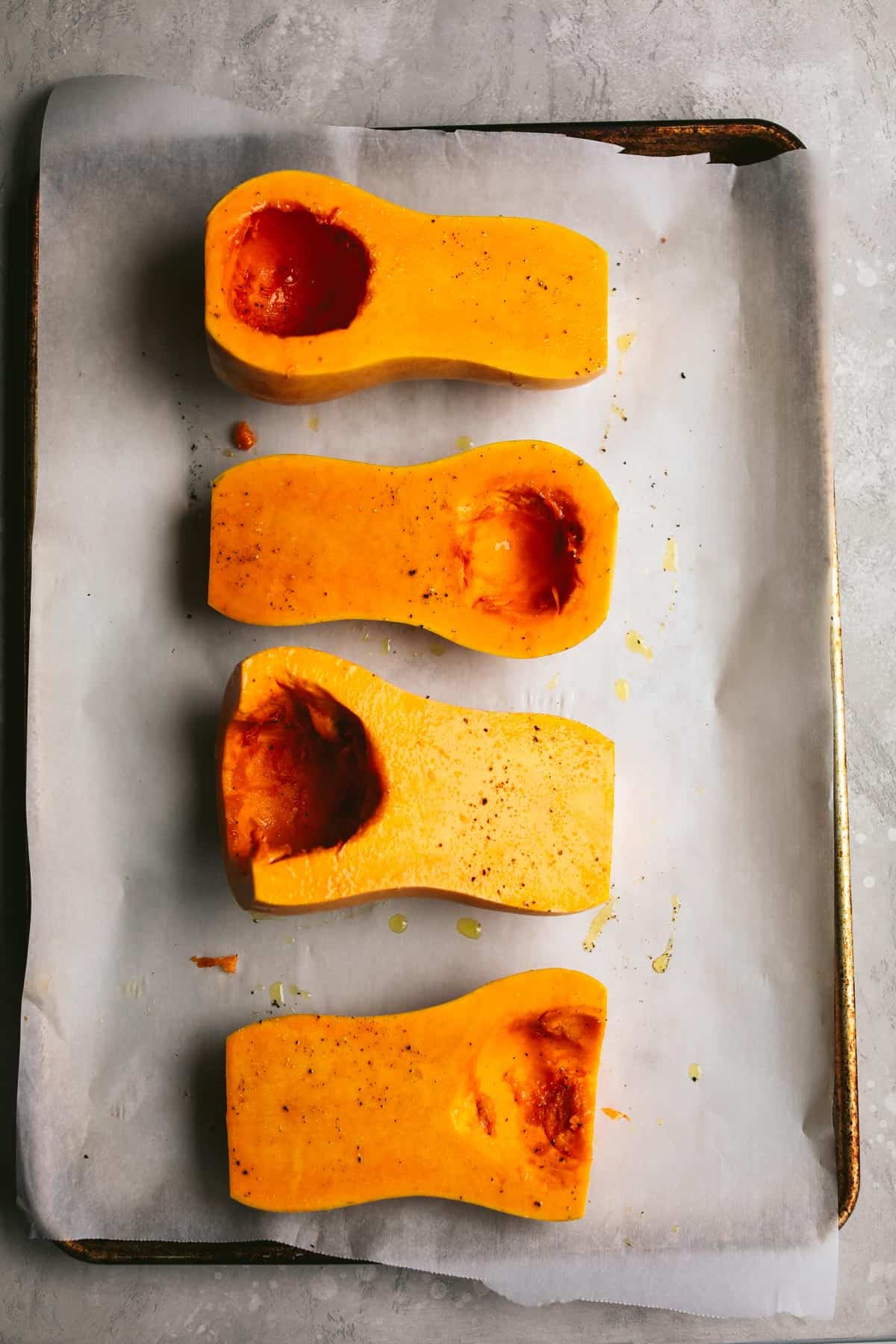 butternut squash in a sheet pan