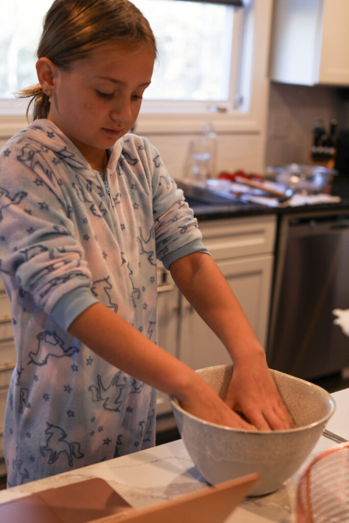 girl making biscuits 